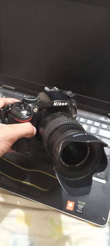 Nikon D5200 with 18/55 battery charger and   v shape pouch 2