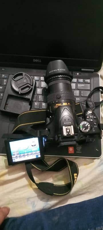 Nikon D5200 with 18/55 battery charger and   v shape pouch 4