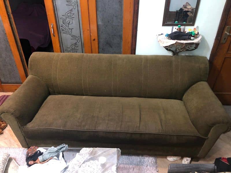 Good quality 2 seater and 3 seater sofa set. Green color. 1