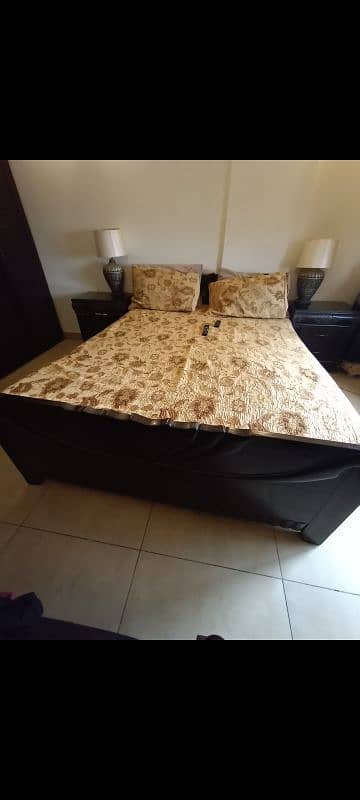 wooden queen bed with 2 side tables 3