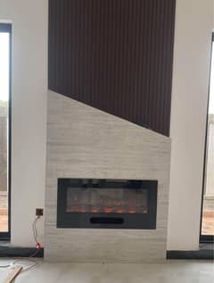 Electric fireplace and Bar. B. Q counter