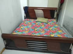 USED WOODEN DOUBLE BED