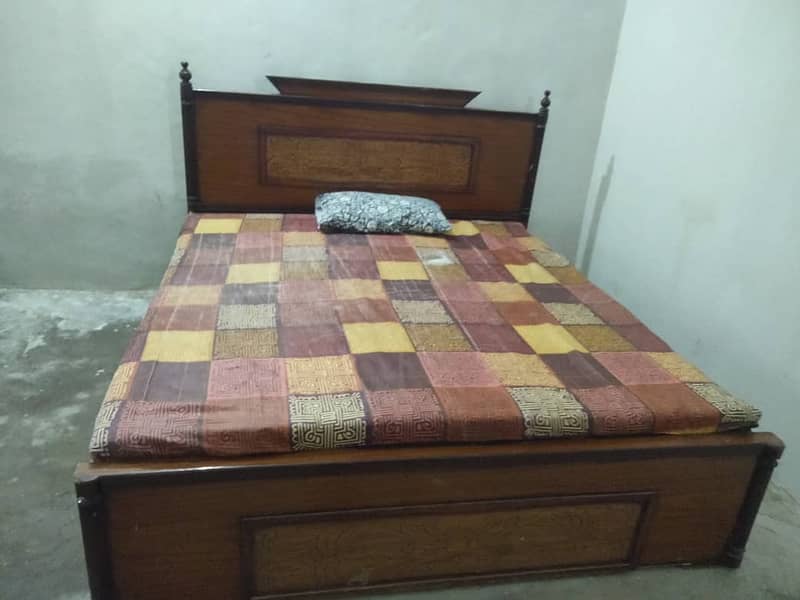 USED WOODEN DOUBLE BED 2