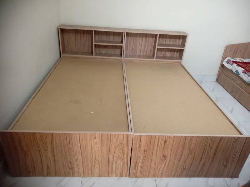 three single bed with draws 0