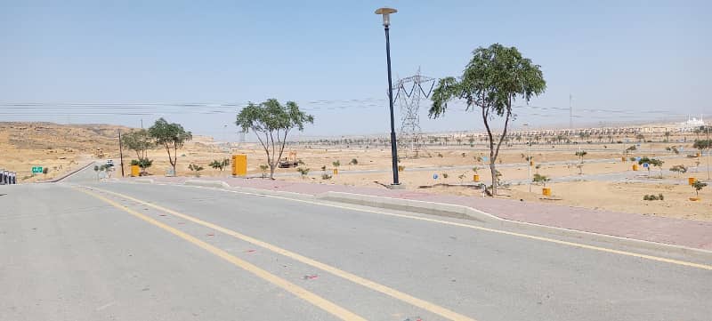 500sq yd Plots at Main Jinnah Avenue Facing with easy access to main Gate of BTK. AT INVESTOR RATES 10