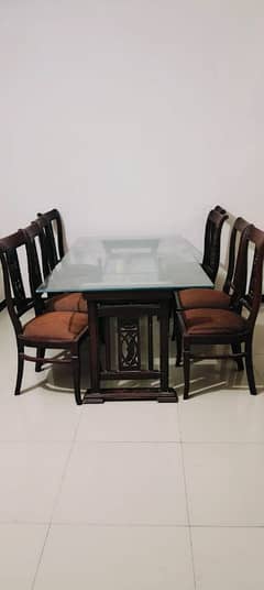 8 chairs and a dining table