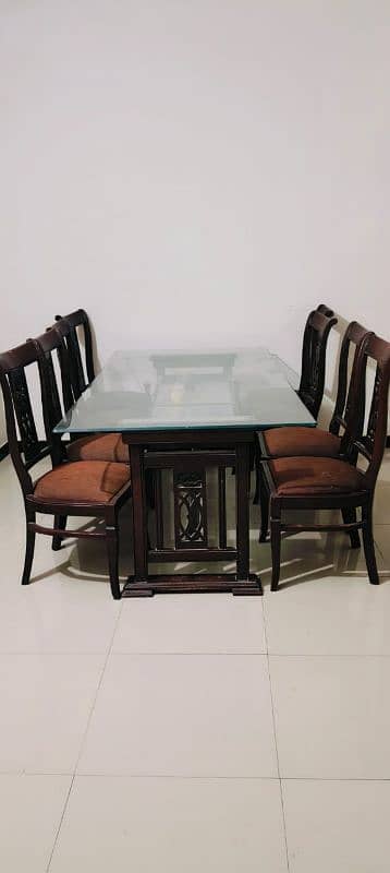 8 chairs and a dining table 0