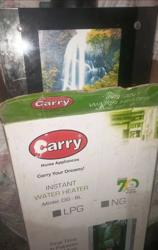 CARRY HOME APPLIANCES ( INSTANT WATER HEATER) 1