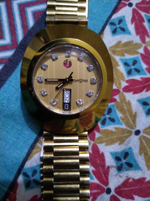 rado watch golden colour 0