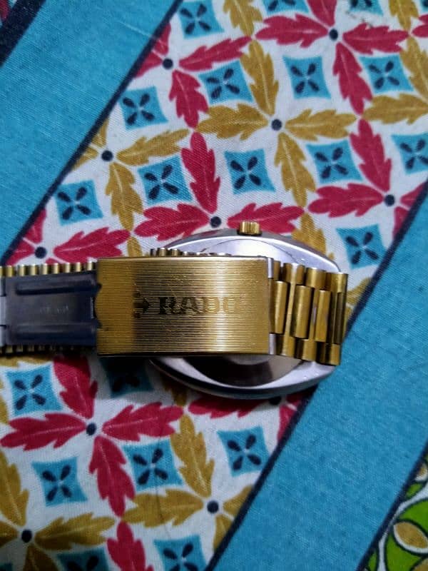 rado watch golden colour 1