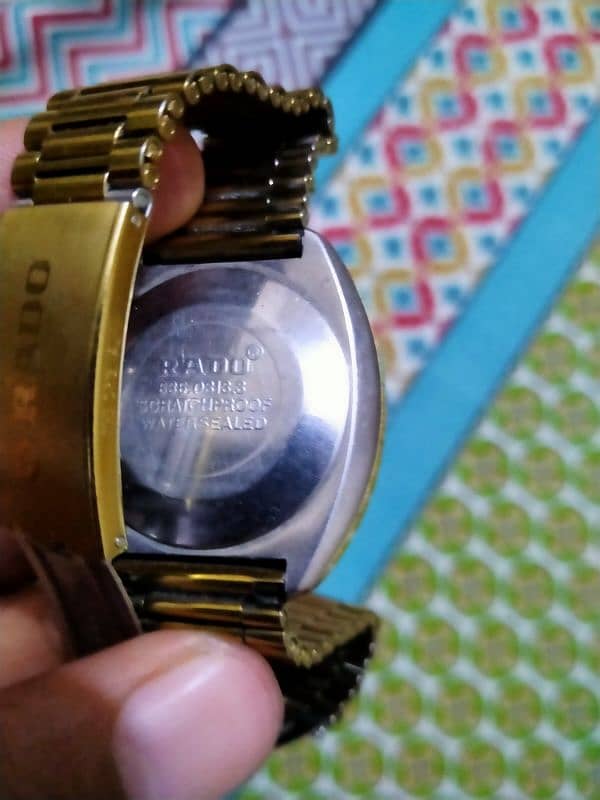 rado watch golden colour 4