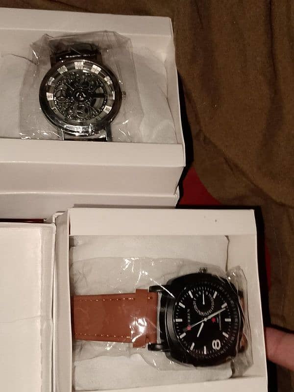 2 men's wrist watches with men purse in reasonable price 0