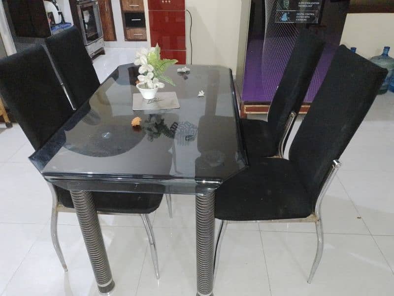 black glass dining table with 4 chair 1