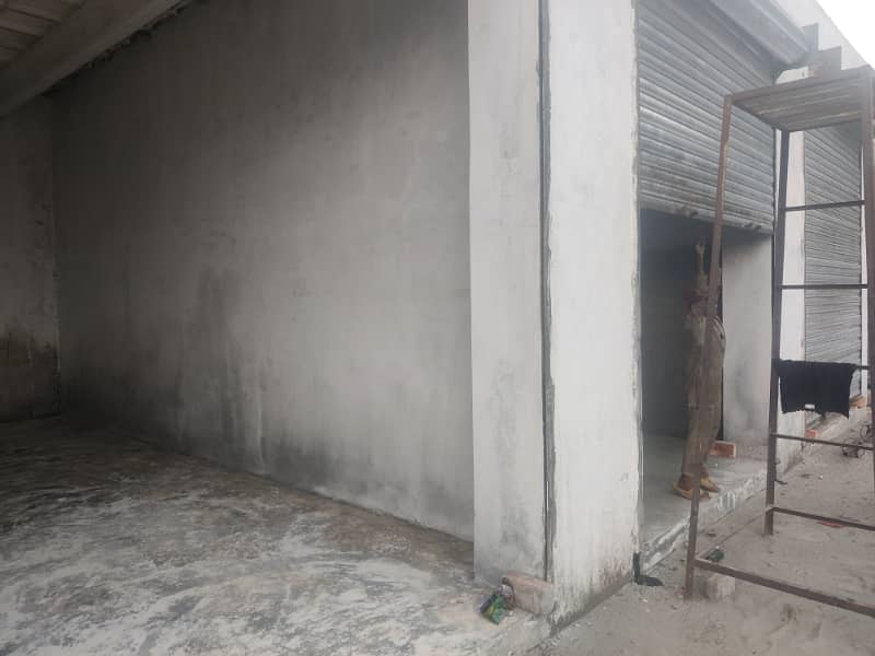 SHOP/WAREHOUSE ON SERVICE ROAD OF RING ROAD NEAR JAMU STOP BEDIAN ROAD 9