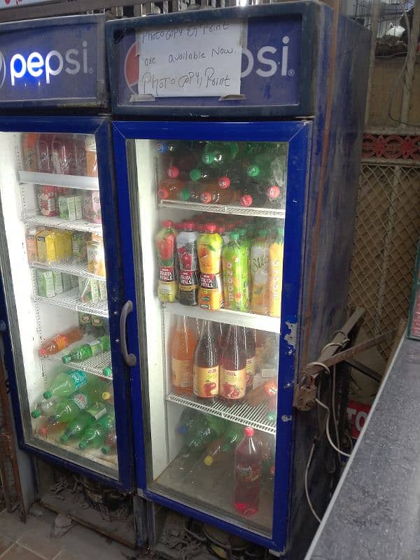 2 pepsi fridge with angle do door frame 0