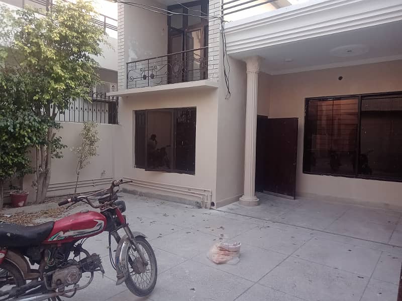 1 kanal outstanding 3 bedroom new renovated in model town D Block for rent 1