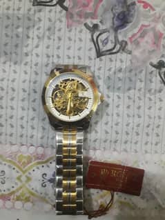 Rolex ki Watch ha Branded.