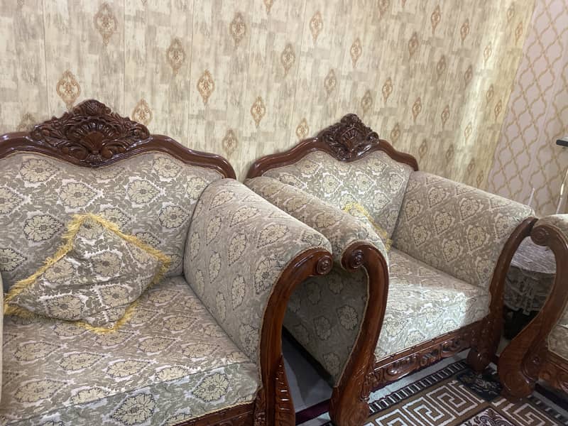 ( on hold till eve ) 7 seater sofa set + table 2