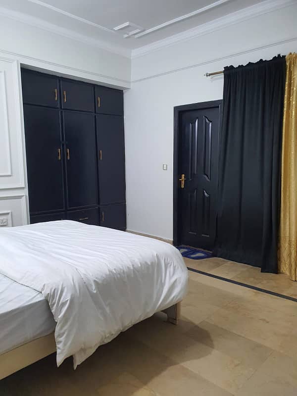 per day two bed fully furnished apartment for rent in E-11 Islamabad 10