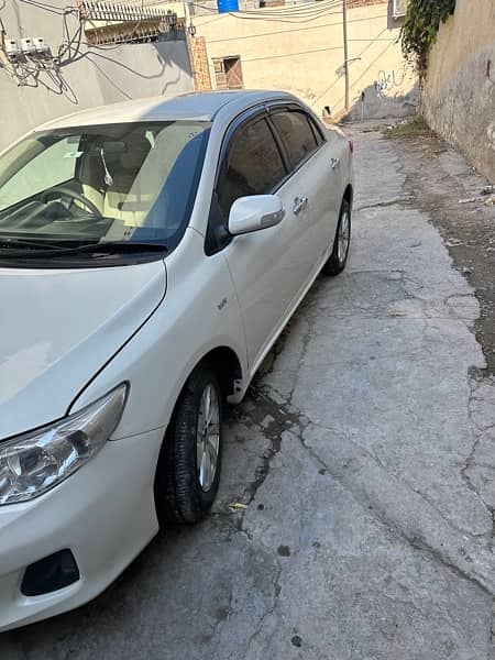 Toyota Corolla XLI 2011 phone no 03185749521 0