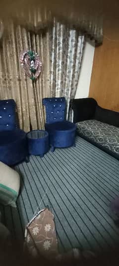 Blue sofa chair in new condition with low price. .