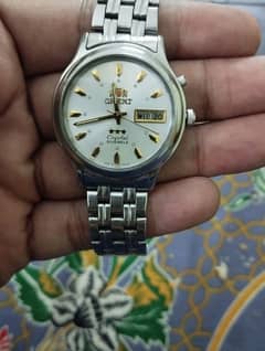 Orient tristar crystal automatic