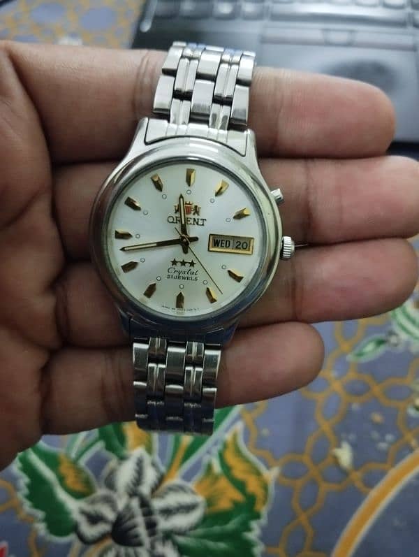 Orient tristar crystal automatic 1