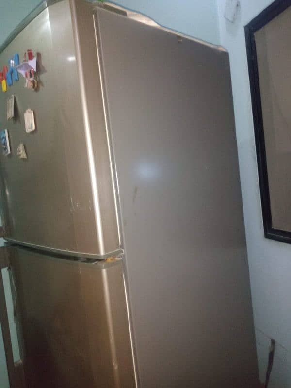 golden color refrigerator excellent condition 0