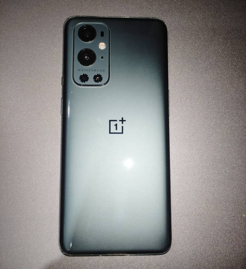 One Plus 9 pro 2 weeks used (charger, armour back cover,  protector) 5