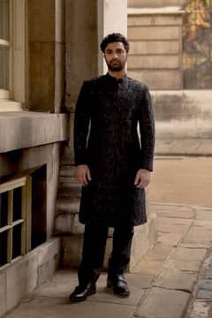 Black. sherwani