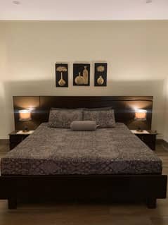 Double bed, side tables, dressing table and footboard