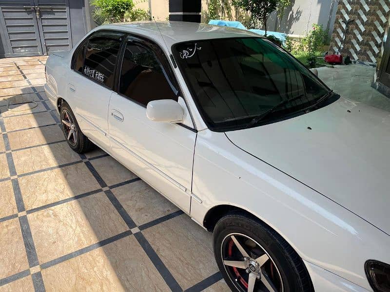 Toyota XE 2000,sindh register, petrol CNG, read ad 13