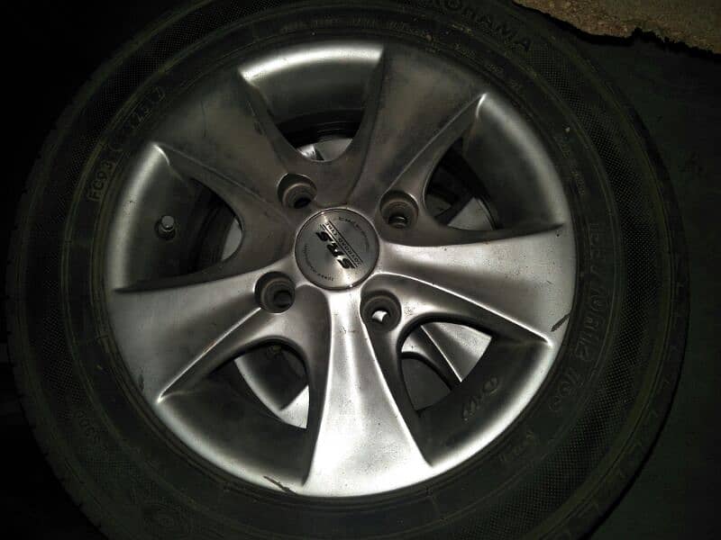 daihatsu cuore alloy rims (almost brand new) 0