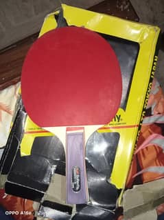 Table tennis racket with balls