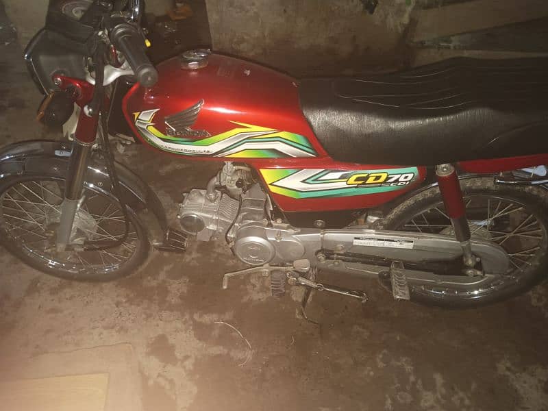 Red Honda CD70 bike. 3