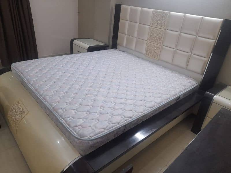 bed with side table and with matress 0