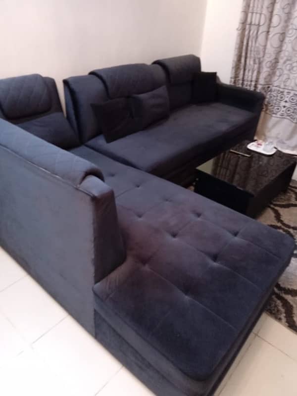 sofa L shape in black colour, within warranty, branded foam used 4