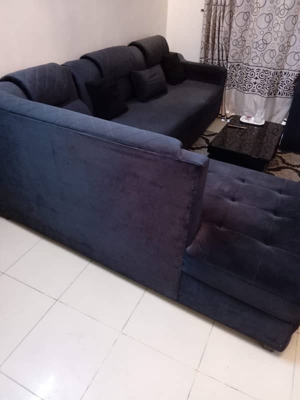 sofa L shape in black colour, within warranty, branded foam used 6