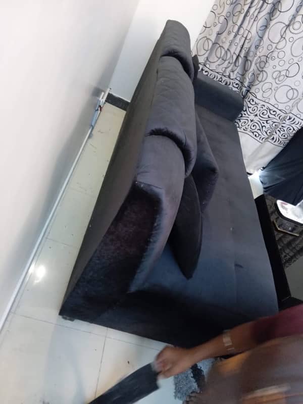 sofa L shape in black colour, within warranty, branded foam used 8