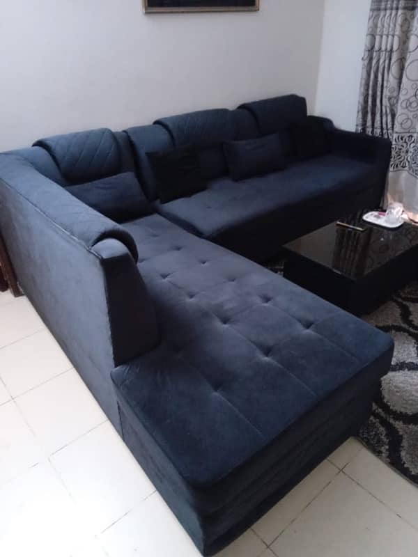 sofa L shape in black colour, within warranty, branded foam used 10