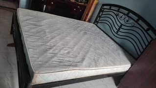 Bed with mattress