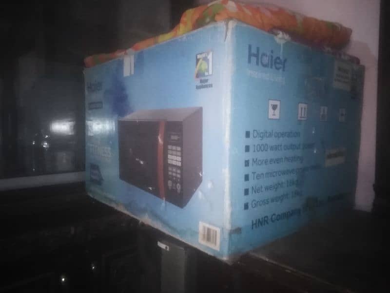 micro oven haier 36100egb bilkol nwo full saizz 2