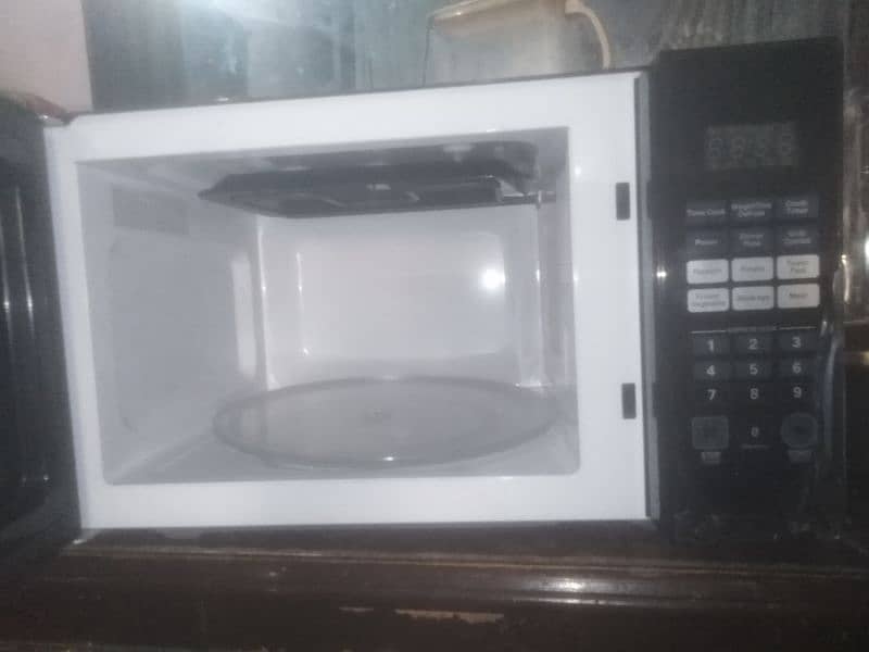 micro oven haier 36100egb bilkol nwo full saizz 4