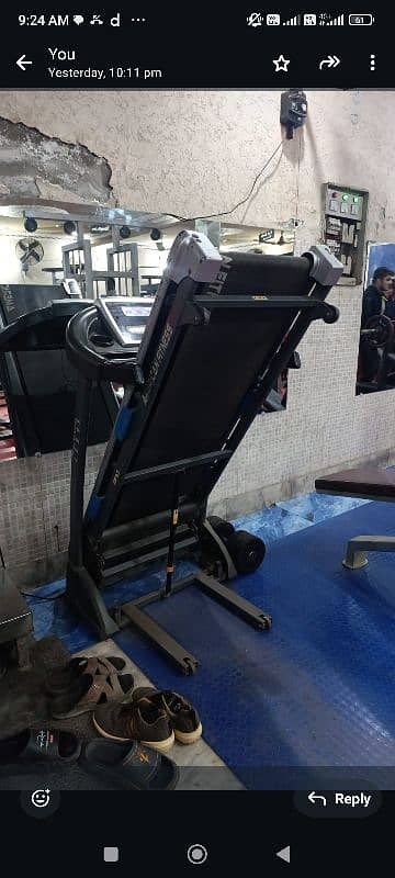 gym equipment treadmill, leg press, leg curl 9