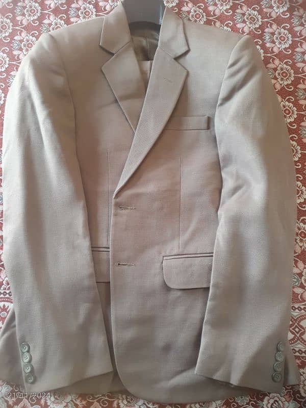 02 pc suit available for sale, only single time used 1