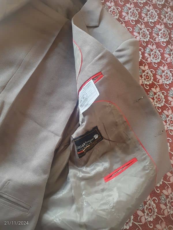 02 pc suit available for sale, only single time used 2