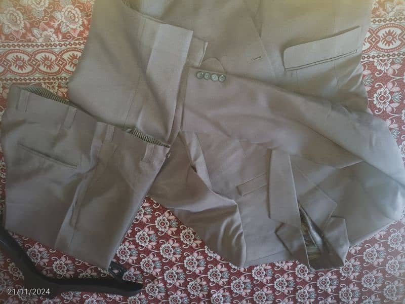 02 pc suit available for sale, only single time used 7