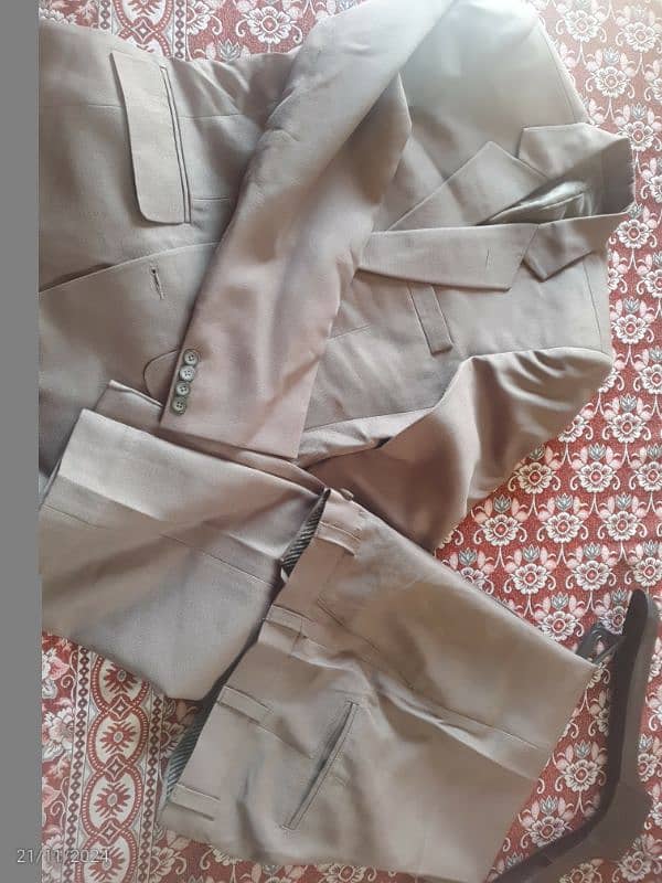 02 pc suit available for sale, only single time used 8