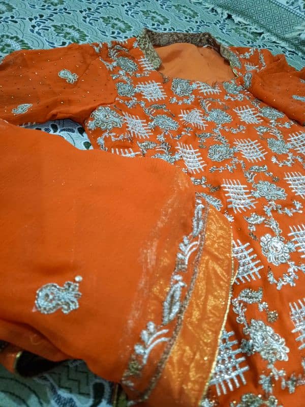 an elegent outfit containing qameez dupatta  and  jamawer trouser 6