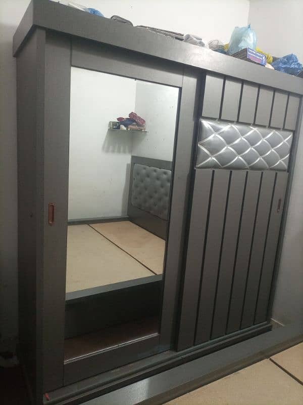 Bed with selinding wardrobe for sale without metrees 1